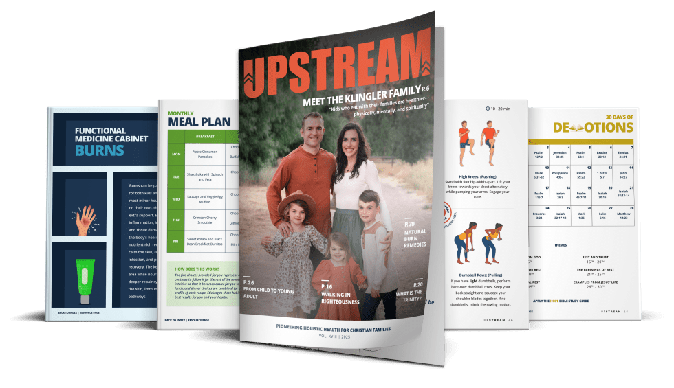 Printed issues of Upstream magazine fanned out, showing the cover and inside pages of meal plans and workouts